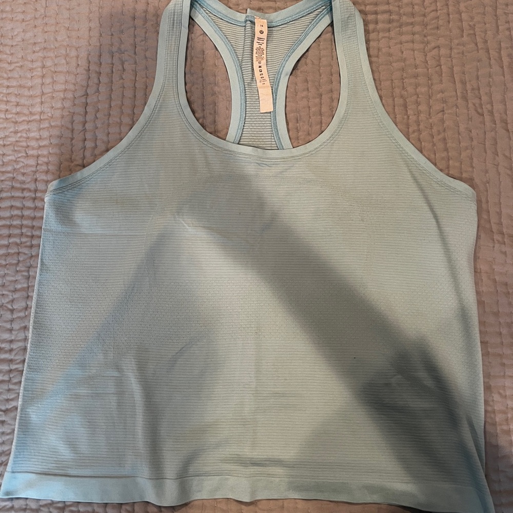 Swiftly Tech Racerback Tank Top 2.0
Waist Length